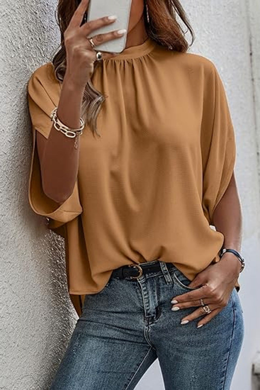 Blouse à manches mi-longues fendue au dos et nouée