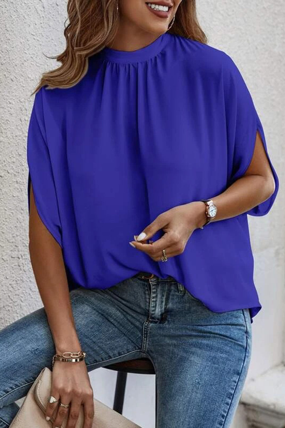 Blouse à manches mi-longues fendue au dos et nouée